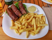 Mici (4 pcs) with Fries and Mustard